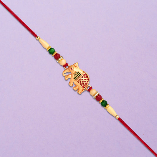 Golden Elephant Rakhi With Red Green Moti