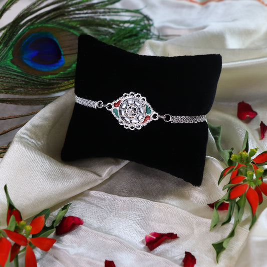 Stylish Rakhi With Intricate Floral Motif And Enamel Touches