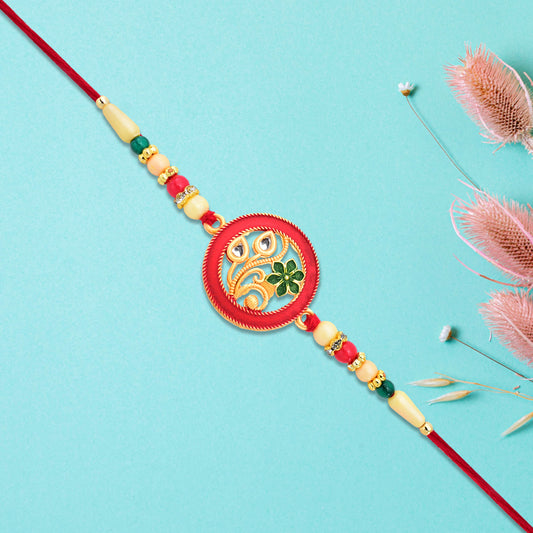 Round Designer Paisley Rakhi With Floral Charm