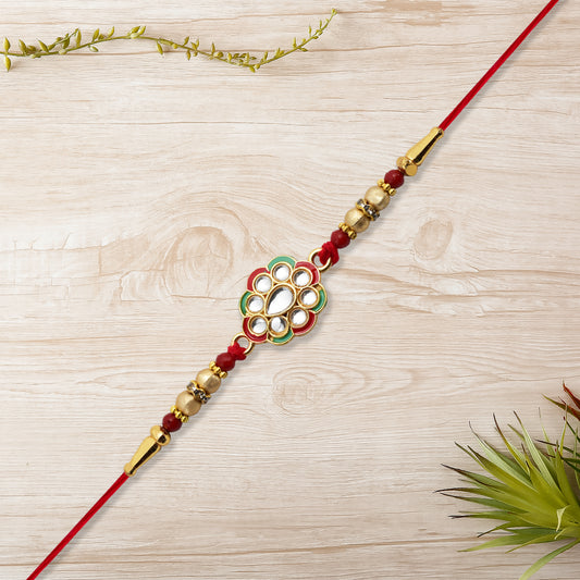 Kundan Work Floral Rakhi With Red Thread