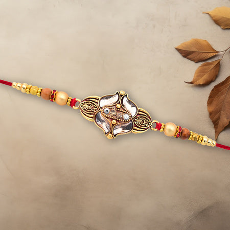 Elegant Floral Designer Rakhi With Gold-toned Beads  Red Thread