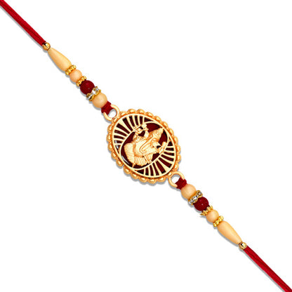Traditional Ganesha Rakhi With Golden Finish And Sacred Red Thread