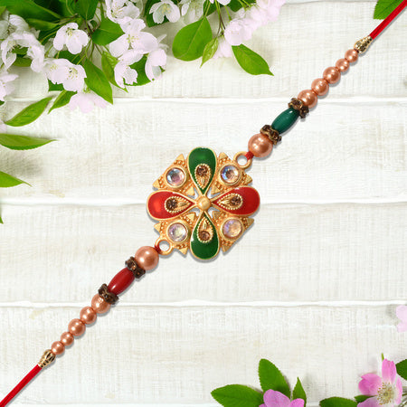 Elegant Meenakari Rakhi With Red-green Enamel  Stones