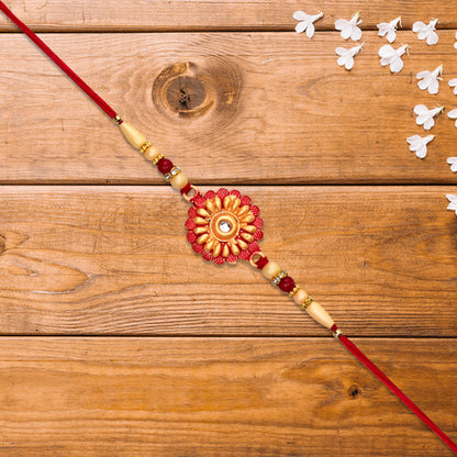 Floral Bead Rakhi With Central Stone