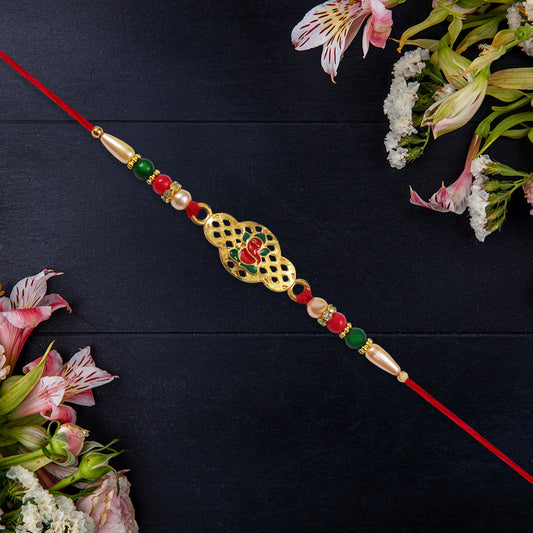 Religious Ganesha Rakhi In Gold Finish