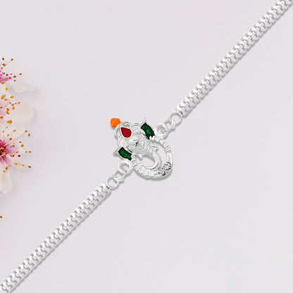 Stylish Ganesha Rakhi With Enamel Highlights And Silver Metal Chain